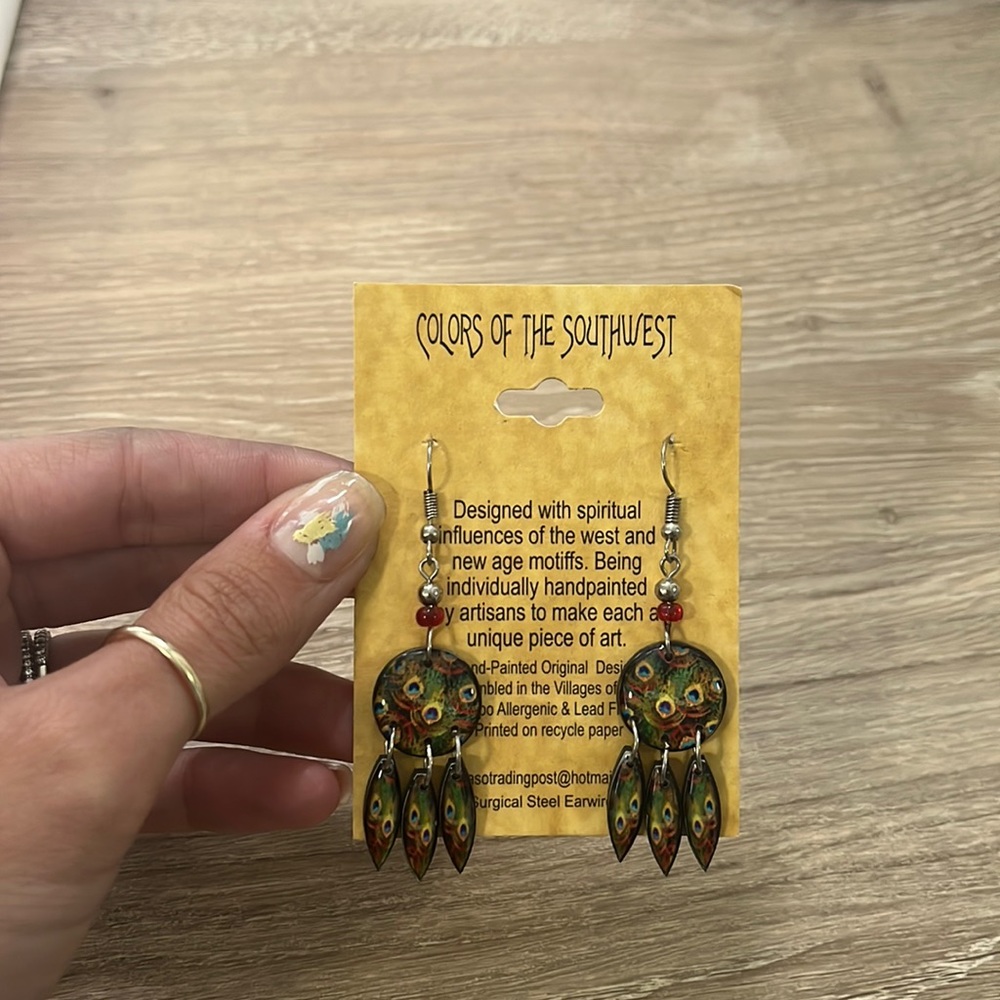 Peacock Earrings hand painted and purchased in Nashville, TN